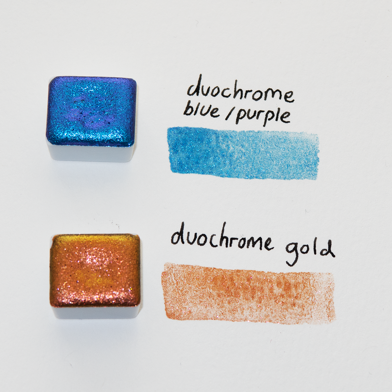 Two duochrome watercolour swatches labeled 'duochrome blue/purple' and 'duochrome gold' on a white background.